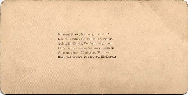 The back of a stereo View by Strohmeyer & Wyman  -  Published by Underwood & Underwood - Princes Street  -  Looking to the west towards the Scott Monument from Waverley