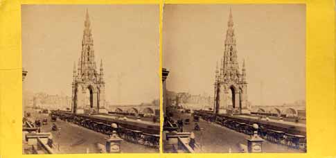 GW Wilson stereo card - The Scott Monument and a line of coaches in Princes Street