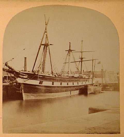 The right hand picture from a stereo pair  -  Unknown photographer  -  Title 'Leith Docks re-masting - 1865
