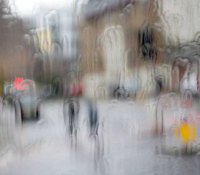 Photo taken in the rain from the front seat on the upper deck of a Lothian Bus  -  Pedestrians and Traffic in the Road at Fountainbridge