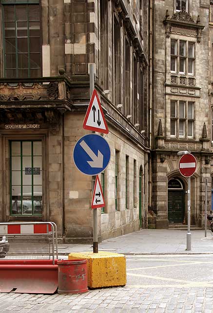 Road signs in George IV Bridge at the top of Victoria Street