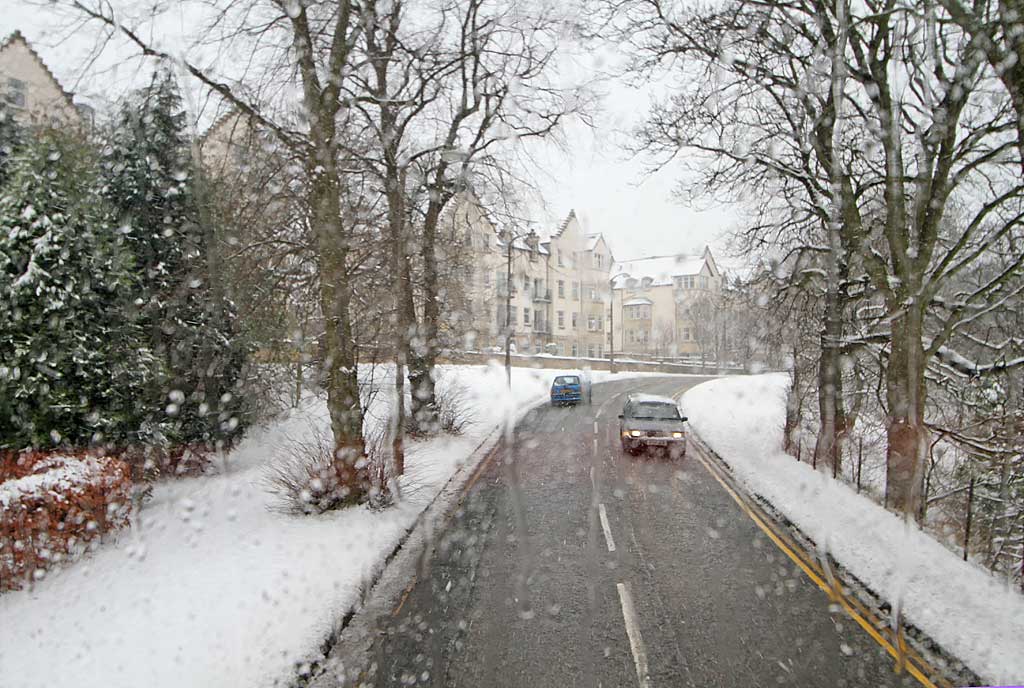 View form the top deck of a No 23 bus travelling to the west along Glenlockhart Road beside the Merchants of Edinburgh Golf Course, towards the Craighouse Campus of Napier University  -  Christmas Eve, 2009