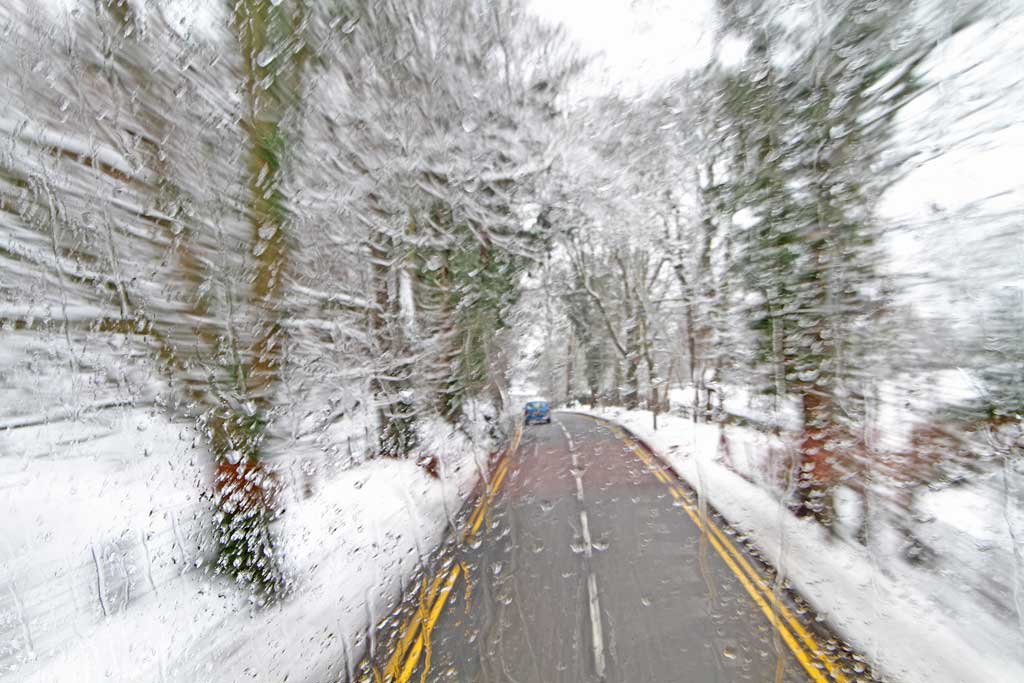 View form the top deck of a No 23 bus travelling to the west along Glenlockhart Road beside the Merchants of Edinburgh Golf Course, towards the Craighouse Campus of Napier University  -  Christmas Eve, 2009