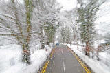 View form the top deck of a No 23 bus travelling to the west along Glenlockhart Road beside the Merchants of Edinburgh Golf Course, towards the Craighouse Campus of Napier University  -  Christmas Eve, 2009