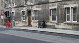 Section of Gorgie Road photographed in 2010.  This is the same section as appeared in a photograph of  a St Cuthbert's horse-drawn milk delivery cart, 1971