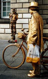 Street Entertainment  -  Golden Cycle Man with Cycle in the Royal Mile during the Edinburgh Festival  -  August 2003