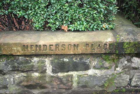 Old street names on buildings and walls  in Leith  -  Henderson Place