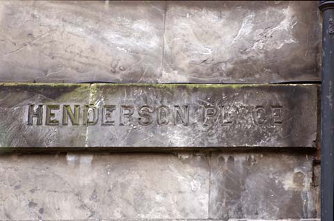 Old street names on buildings and walls  in Leith  -  Henderson Place