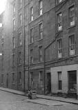 Dumbiedykes Survey Photograph - 1959  -  The Barber's Shop in Heriot Mount with a corporation dustcart parked outside.