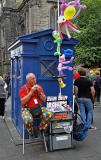 Police Box and Street Entertainer in the High Street, during the Edinburgh Festival Fringe, 2010