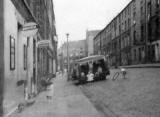 Children playing with a gird in Jamaica Street