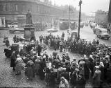 A crowd gatrhers at the Foot of Leith Walk.  Was this photo taken in 1951 or in 1955?