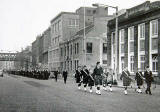 1st Leith Boys' Brigade Company march passes under the railway bridge beside Jane Street, near the foot of Leith Walk