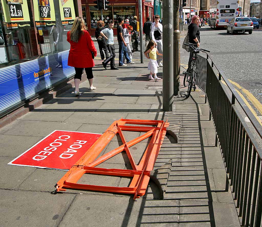 Road sign on the pavement at tht foot of Leith Walk