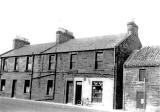 Mrs Brand's shop, next to the Longstone Inn, Longstone Inn  -  photographed around 1960