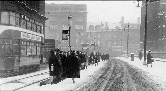 Lothian Road  -  Looking towards Princes Street  -  Waiting in the snow for a tram