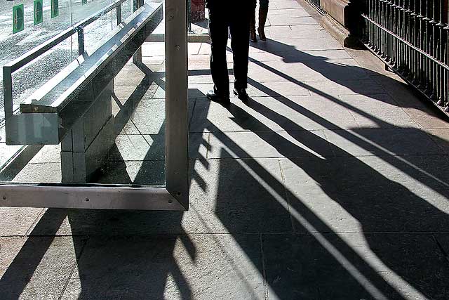 Shadows at the bus shelter beside the Caledonian Hotel in Lothian Road