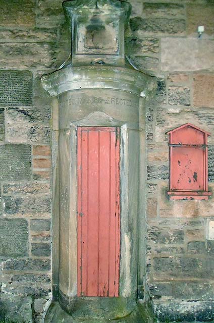 Cabinet on the wall of one of the buildings in Pier Place, Newhaven, 2011