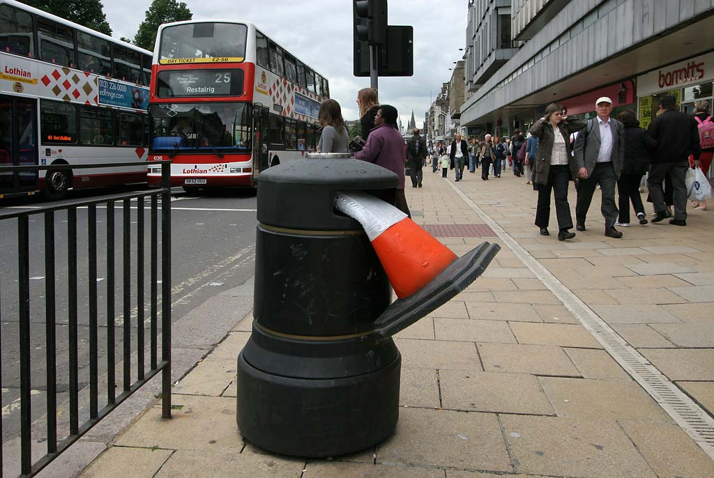 Cone in a litter bin at Princes Street, opposite the foot of the Mound