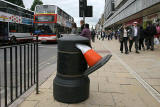Cone in a litter bin at Princes Street, opposite the foot of the Mound