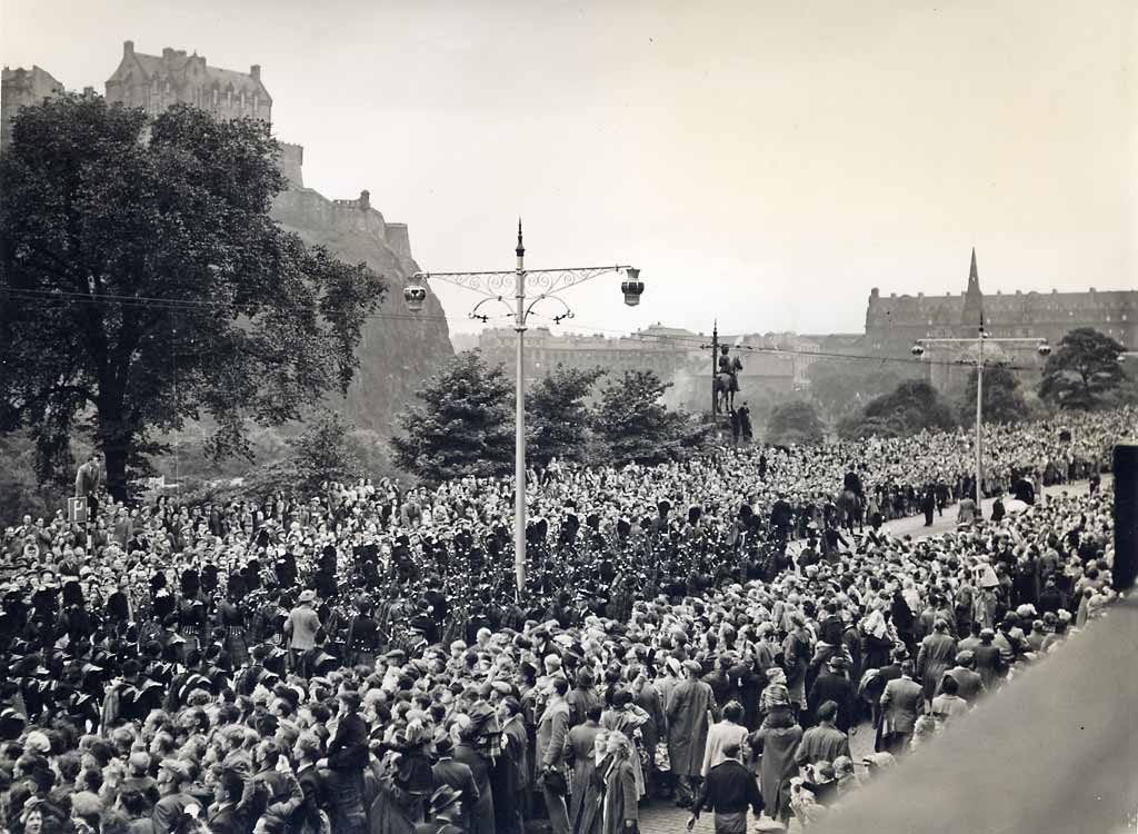 Photograph by Norward Inglis  -  Masssed Pipers march along Princes Street towards the West End during the Gathering of the Clans  -  18 August 1951