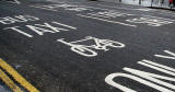 Road markings introduced into Edinburgh New Town in 2005 as part of the Central Edinburgh Traffic Management Scheme  -  Looking east along Princes Street from the junction with Hanover Street