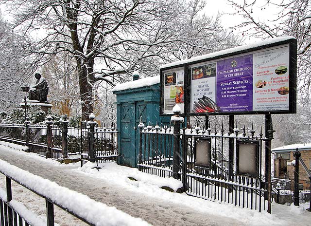 Statue, Police Box and Notice Board, in the snow, at the West End of Princes Street  -  December 2010