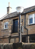 Randolph Lane  -  Lamp Standard mounted on a wall