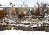 Looking east across the Water of Leith to Stockbridge Colonies, Reid Terrace from Arboretum Acenue  -  December 2009