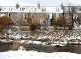 Looking east  across the Water of Leith to Stockbridge Colonies, Reid Terrace from Arboretum Acenue  -  December 2009