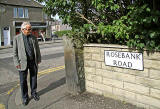 John Stevenson beside the former entrance to Wardie Farm, on the corner of Rosebank Road and Granton Road