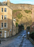 Looking to the east along St Leonard's Lane towards Salisbury Crags in Holyrood Park
