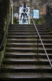 Graffiti on a wall half way up  News Steps, leading from Market Street to St Giles Street, Edinburgh  -  December 2013