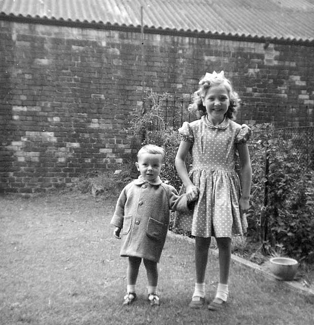 Forbes Wilson and his Cousin, Lorraine,  in the back garden at 28 Thorntree Street, Leith  -  1960