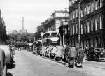 Waterloo Place  -  Three trams and a Queue