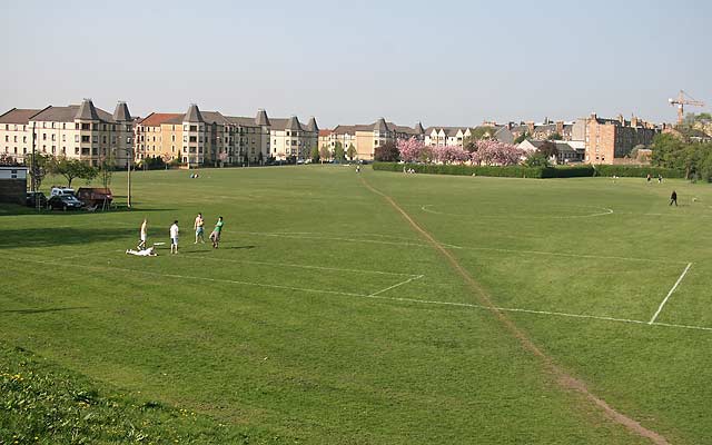 Looking north across the eastern side of Harrison Park  to West Bryson Road, from Harrison Road beside the Union Canal