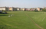 Looking north across the eastern side of Harrison Park  to West Bryson Road, from Harrison Road beside the Union Canal