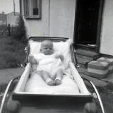 Francis in her pram outside her prefab at 8 West Pilton Terrace.  THe photo was taken in 1964.  The prefab was semolished in 1968.