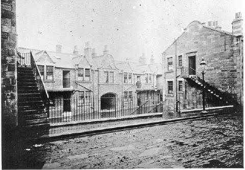 Where and when was this photograph of railings, stairs and an arch taken?