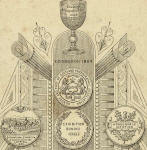 Zoom-in further to the back of a cabinet print showing a cup and medals awarded to A Swan Watson