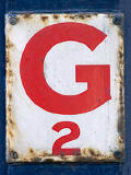 Small enamel plate with the lettet 'G'  -  ,photographed at  Bernard Street, Leith.  Did this have a connection with gas/