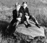 Tam Croal and his brother on the Slidey Stane in Holyrood Park