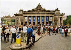 Crowds gather outside the Royal Scottish Academy in Princes Street to watch the Edinburgh Festival Cavalcade on 3 August 2003