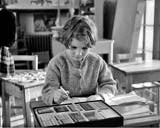 Challenger Lodge  -  6-year-old Gillian mastering arithmetic by the Cusenaire System  -  Photograph published in 'The Scotsman', February 8, 1959