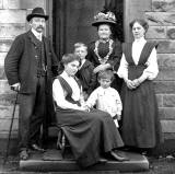 The first family at Kirkgate, Liberton on the doorstep of their house, around 1900