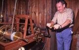 Ritchie  -  The clock winder winding the clock at the Highland Tollbooth church - 1992