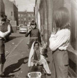 Fiona Logan with her sister Julie and brother Malcolm playing at getting married, at Murano Place, around 1968