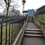 Looking up the path from Princes Street Gardens towards the Police Box near the West End of Princes Street  -   February 2010