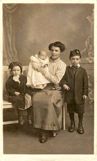 Postcard by Morrisons  -  Family possibly wearing Edwardian clothing