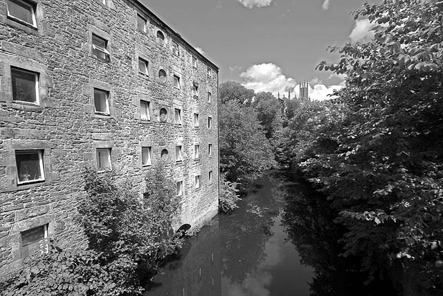 Looking NE, downstream, along the Water of Leith from Dean Path Bridge towards the church standing at the NW corner of Dean Bridge